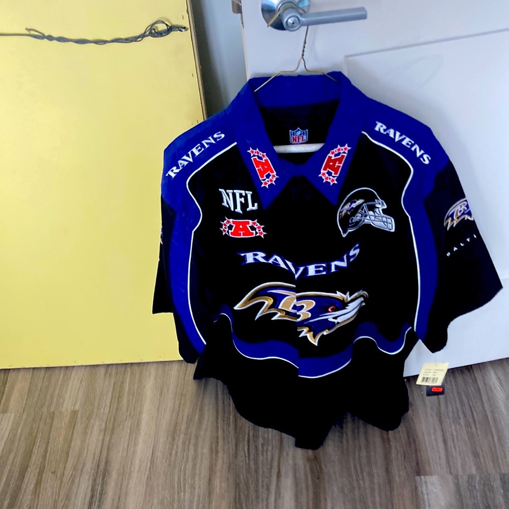 Ravens bowling shirt with tag never worn . If your a Ravens fan so cool